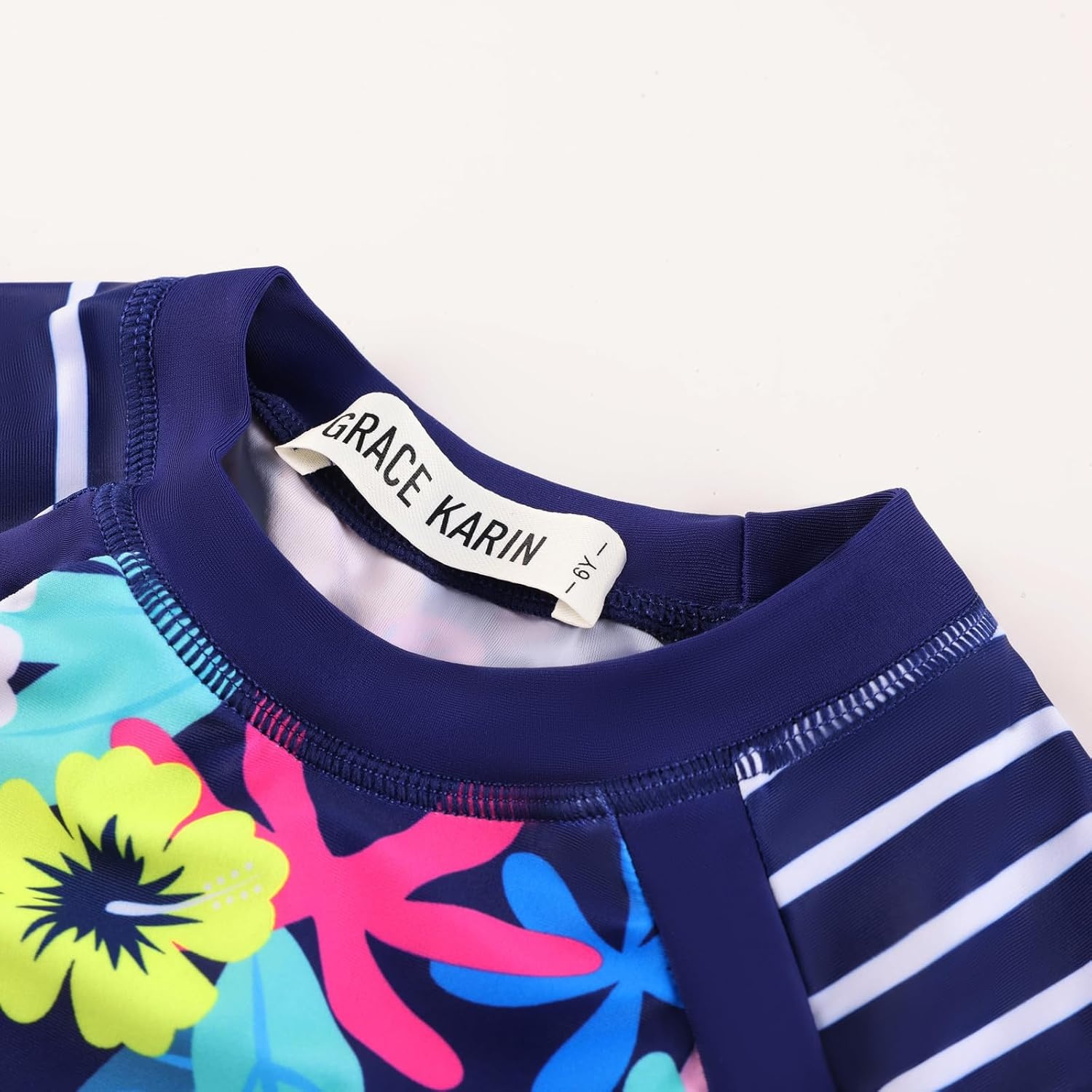 image:imageGRACE KARIN Girls Long Sleeve Swimsuit Two Piece Rashguard Floral Swimwear 614YNavy Background With Vibrant Blooms